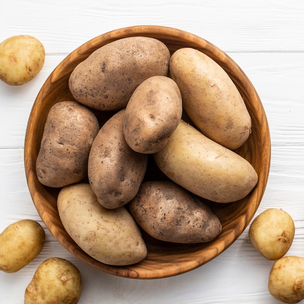 Natural potatoes on table