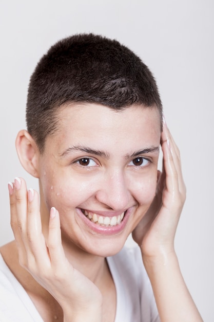 Natural smiley woman looking at camera