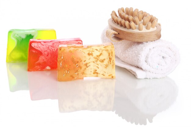 Natural soap with white towel and brush