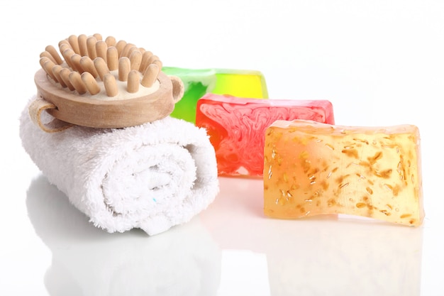 Natural soap with white towel and brush