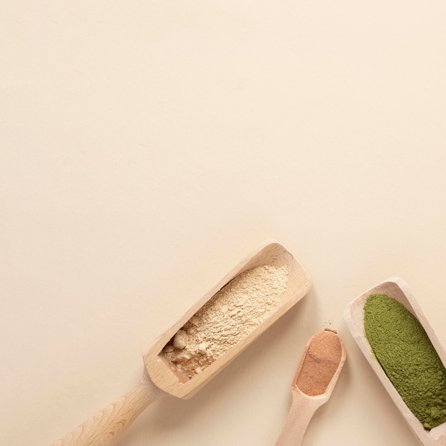 Natural spa sand in wooden spoons