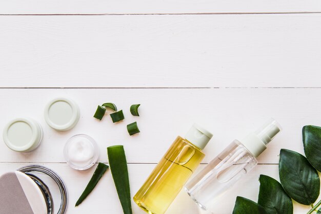 Natural spas ingredients on white wooden background