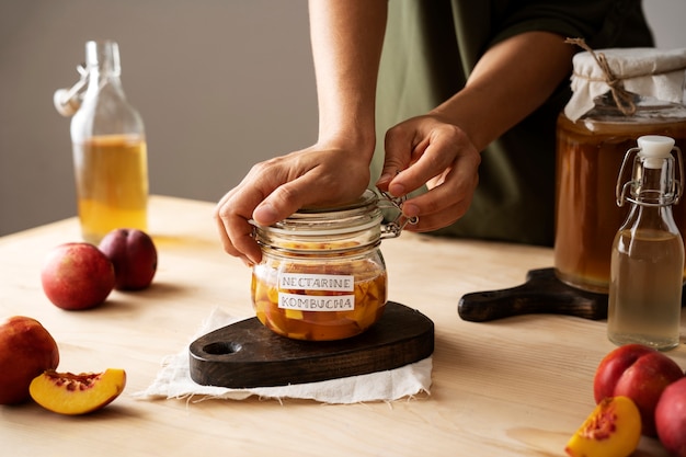 Nectarine kombucha jar with label