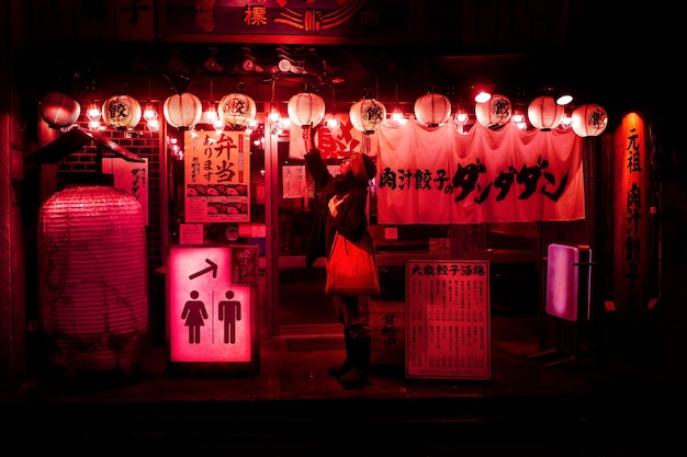 Neon light bathroom sign at night