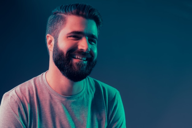 Neon portrait of a young attractive man