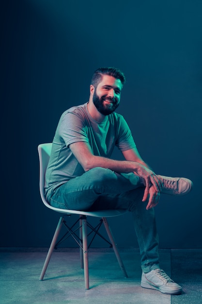 Free photo neon portrait of a young attractive man