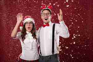 Free photo nerd couple are shocked from first snow