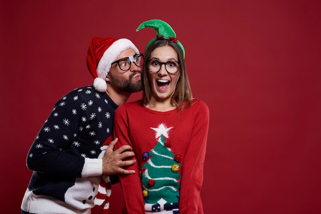 Nerd couple in Christmas time isolated