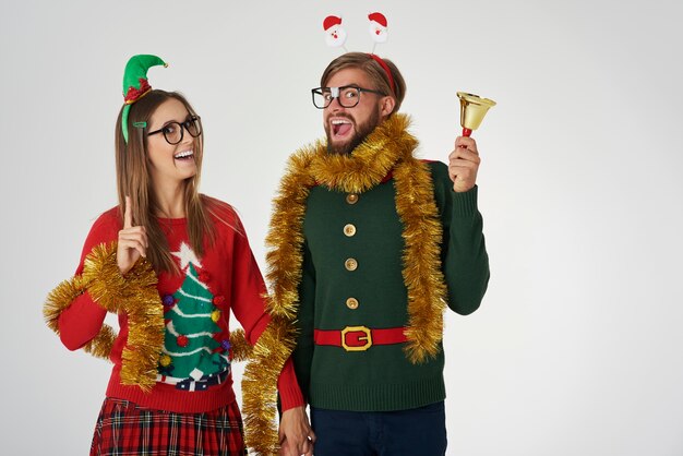 Nerds with golden chain on gray wall