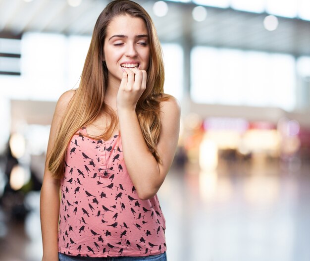 nervous young woman on white background