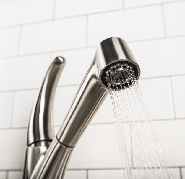 New and  modern steel faucet in the kitchen