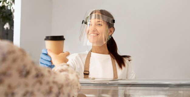 New normal at the coffee shop with face shield