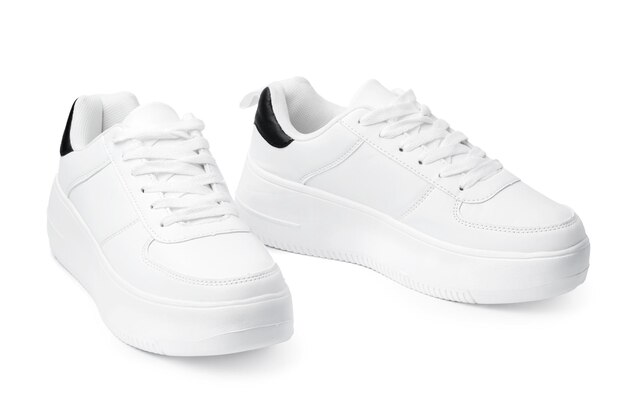 New pair of white sneakers isolated on white