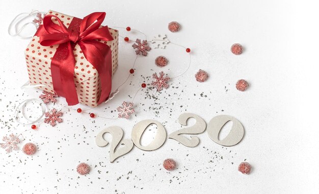 New year 2020 white festive wall with gift