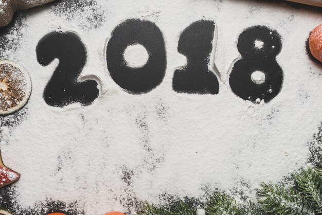 New year background with 2018 written in snow