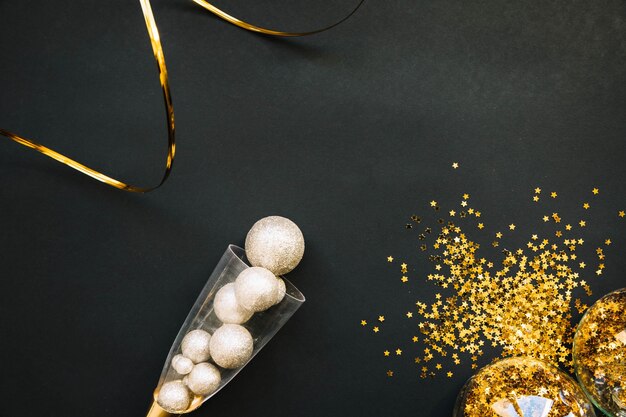 New year background with balls in glass