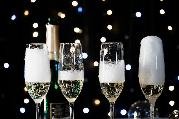 Free photo new year background with champagne glasses