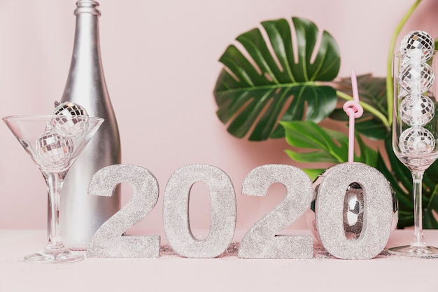 Free photo new year champagne bottle and glass
