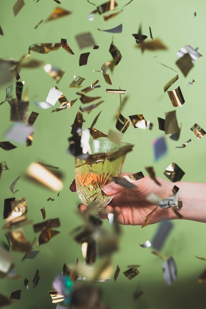 Free photo new year concept with confetti and champagne