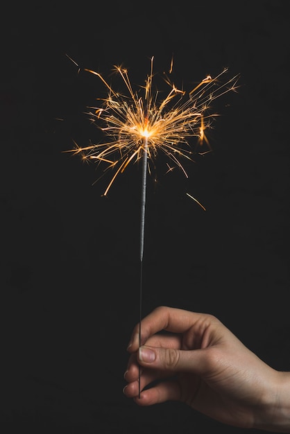 Free photo new year concept with sparkler