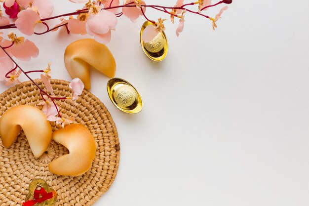 New year fortune cookies and flowers top view