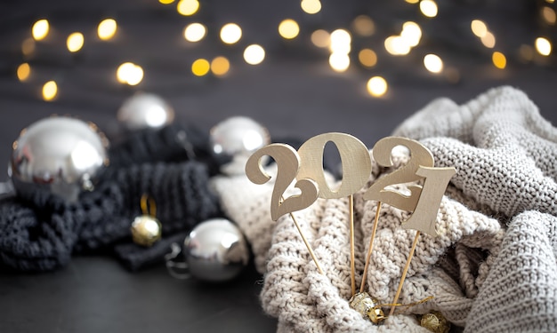 New year's composition with wooden new years number and festive background.