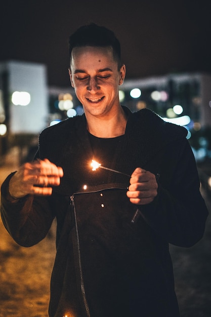 Free photo new year with friends sparklers