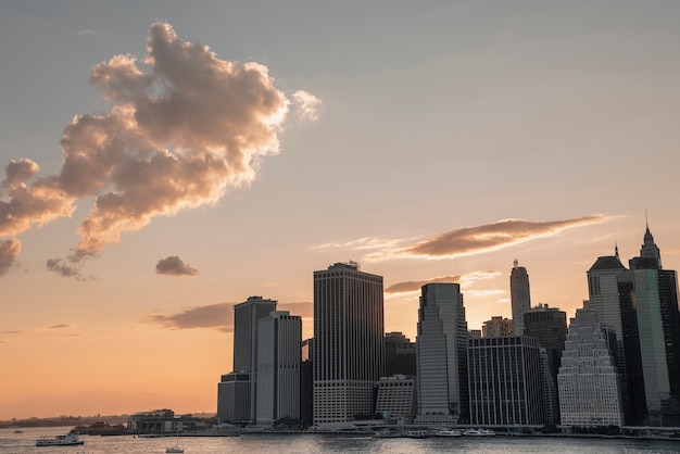 New york city financial district with clouds