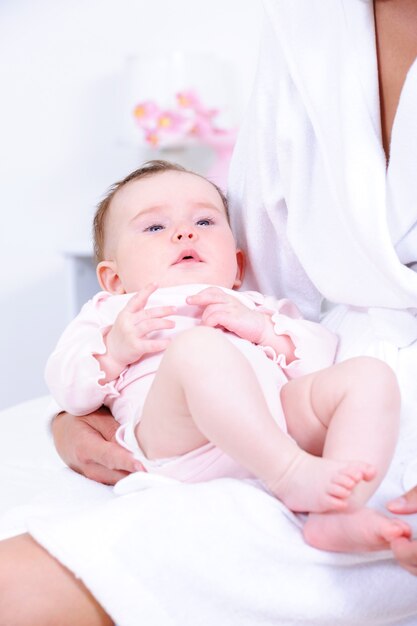 Newborn baby in mother's hands