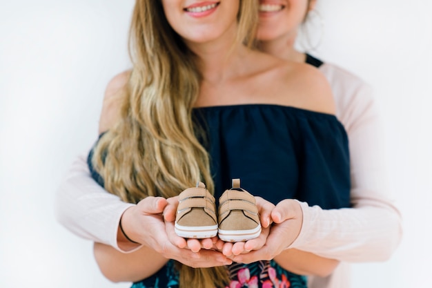 Free photo newborn concept with lesbian couple