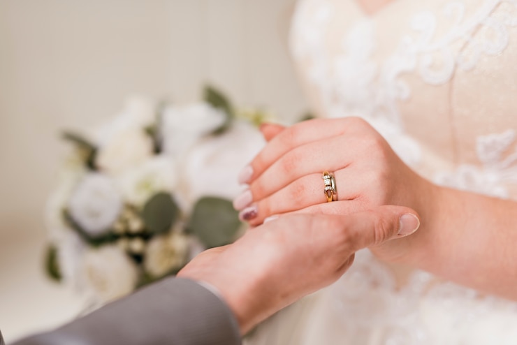 Free Photo newlyleds exchanging ring
