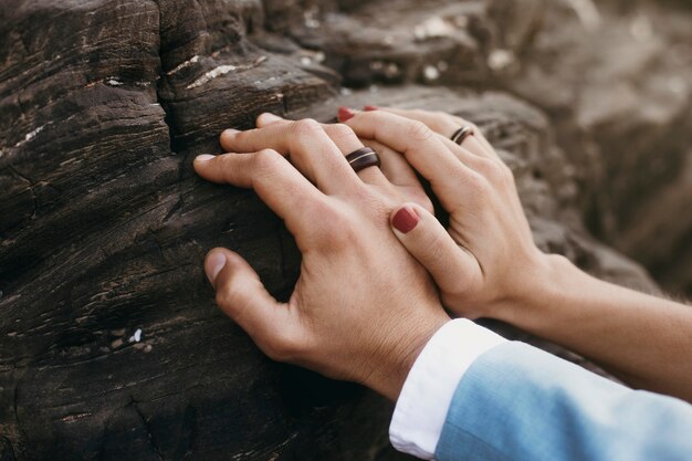 Newlyweds having their wedding at the beach