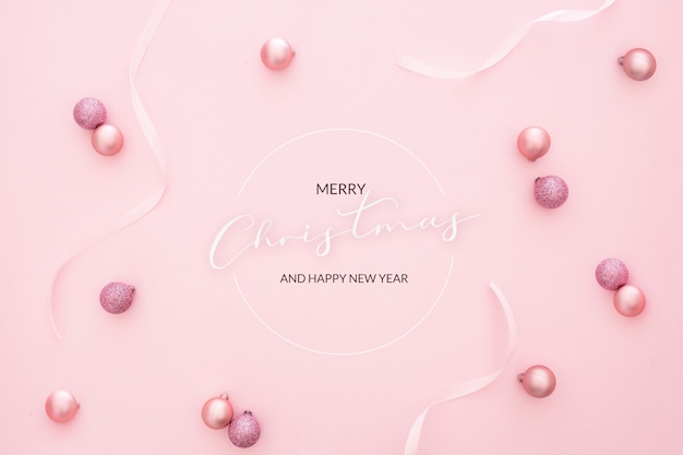 Nice christmas background with balls on pink background