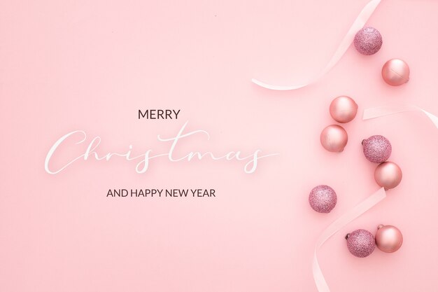 Nice christmas background with balls on pink background