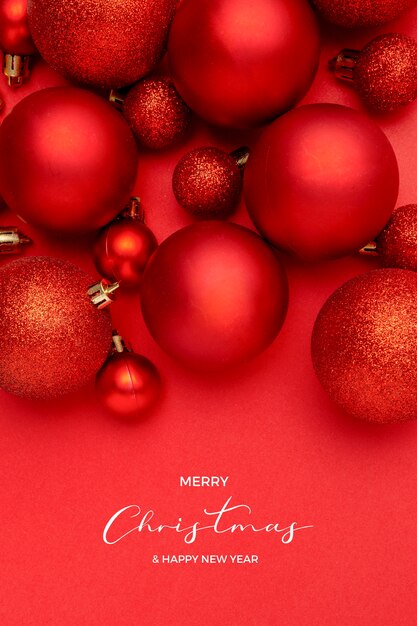 Nice composition of red christmas balls on red background