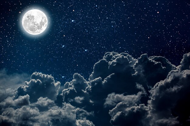 星と月と雲と夜の空 プレミアム写真