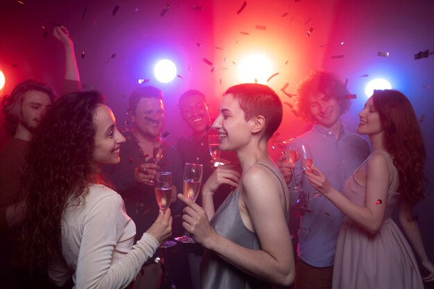 Nightlife with people dancing in a club