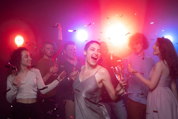 Nightlife with people dancing in a club