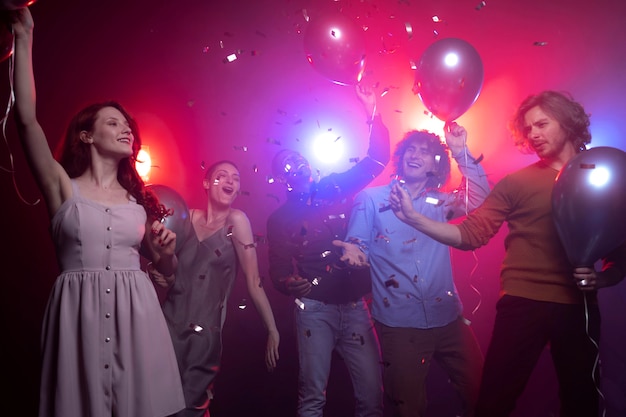 nightlife with people dancing in a club