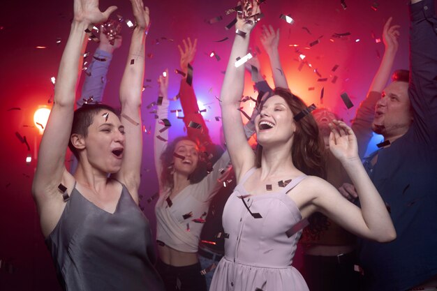 nightlife with people dancing in a club