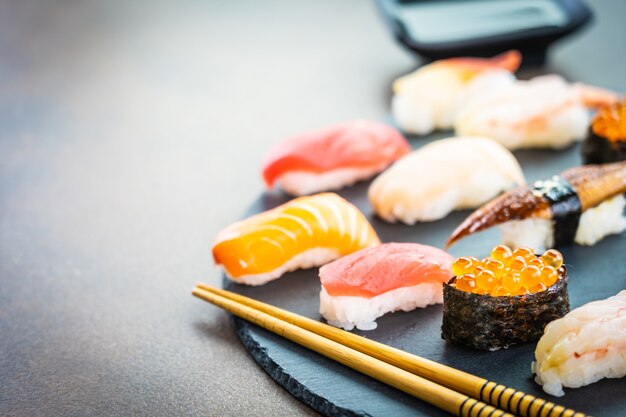 Nigiri sushi set with salmon tuna shrimp prawn eel shell and other sashimi