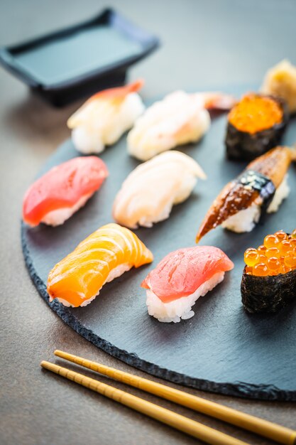 Nigiri sushi set with salmon tuna shrimp prawn eel shell 