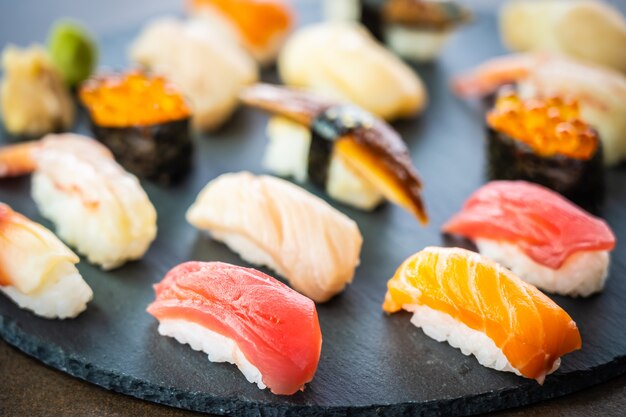 Nigiri sushi set with salmon tuna shrimp prawn eel shell
