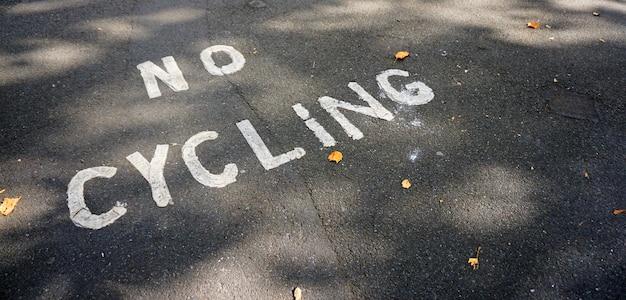 Free photo no cycling bicycle bike park safe path forbidben