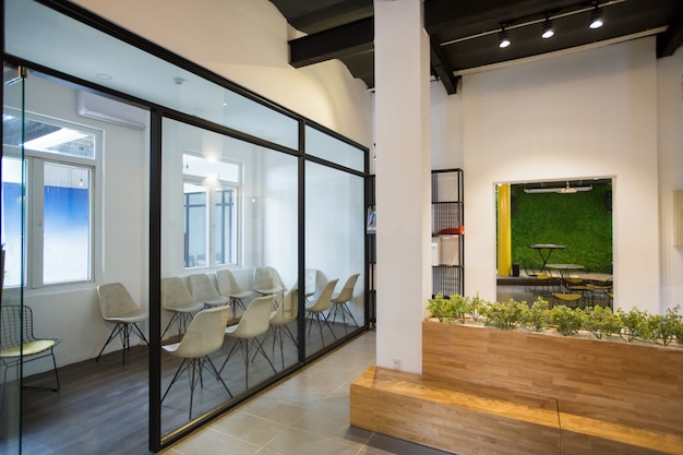 Nobody in office lobby with wooden bench