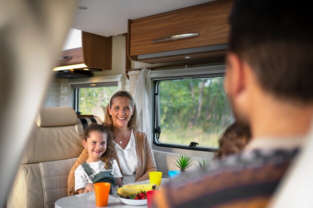 nomad family having fun together in tiny house