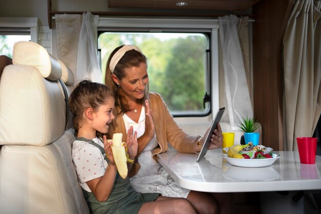 nomad family having fun together in tiny house