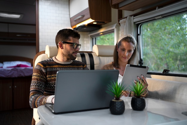 Free photo nomad family having fun together in tiny house