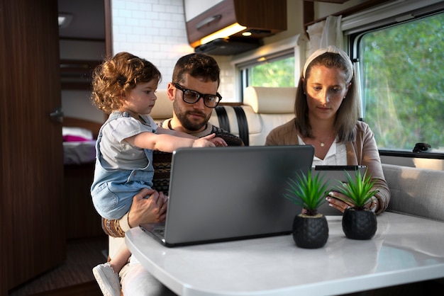 Nomad family having fun together in tiny house