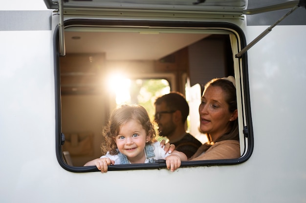 Nomad family having fun together in tiny house